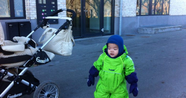 Learning to walk in winter jumper suit