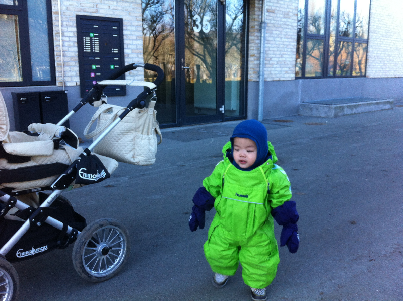 Learning to walk in winter jumper suit